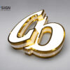 Side-perforated led channel letters gold illuminated letters