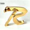 Non-illuminated gold electroplated metal letter sign