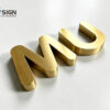 Gold brushed finish non-illuminated metal sign metal letters