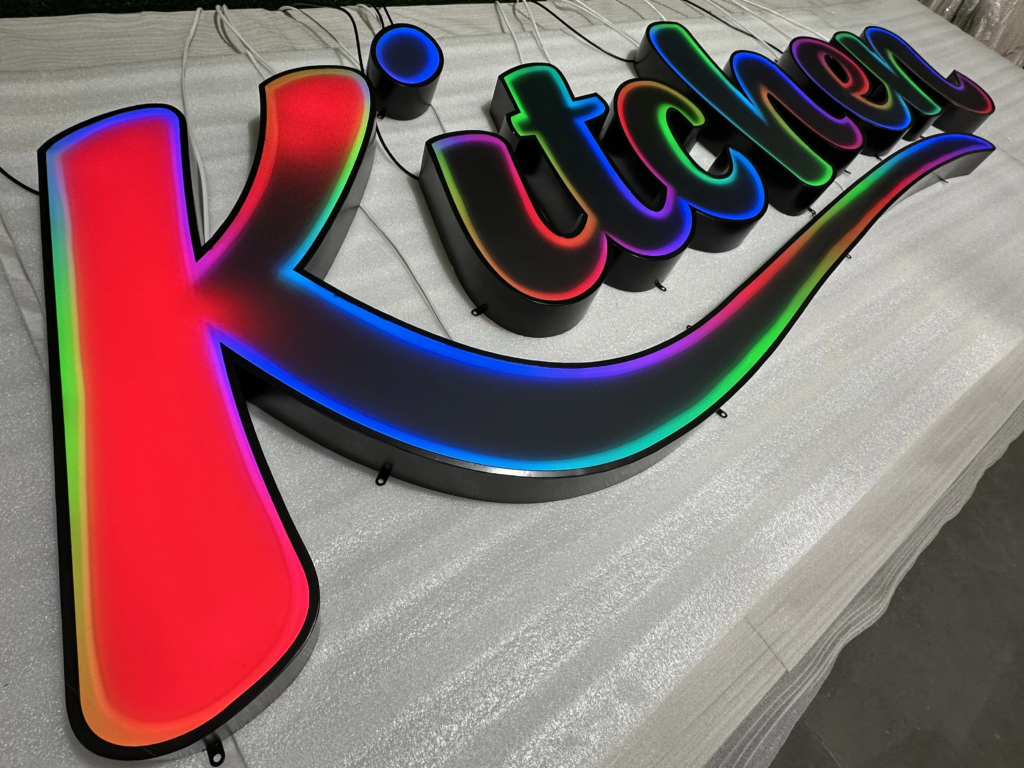 Blackboard-style color-changing channel letters with running border lights