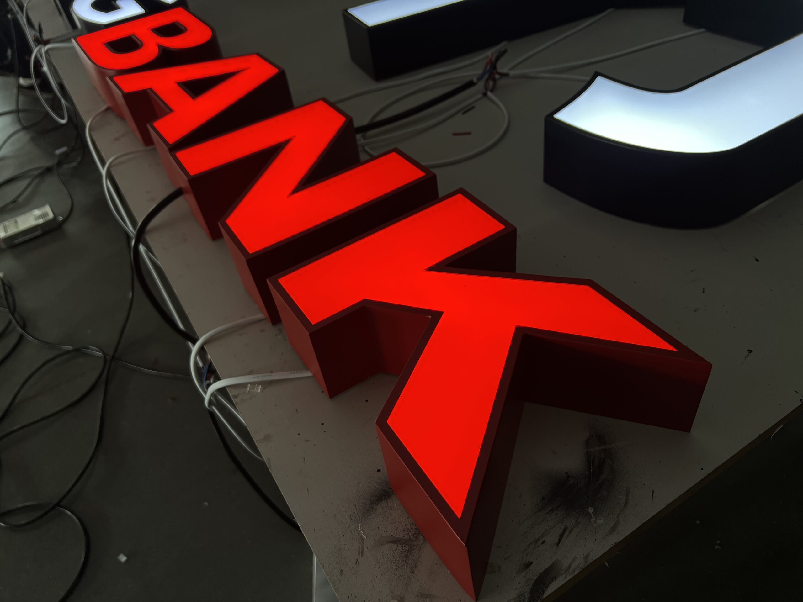 Custom signs manufacturer producing illuminated signs in China factory