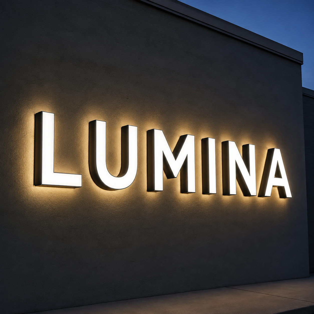 Front and back lit channel letters installed on a dark storefront wall with white front illumination and red halo lighting