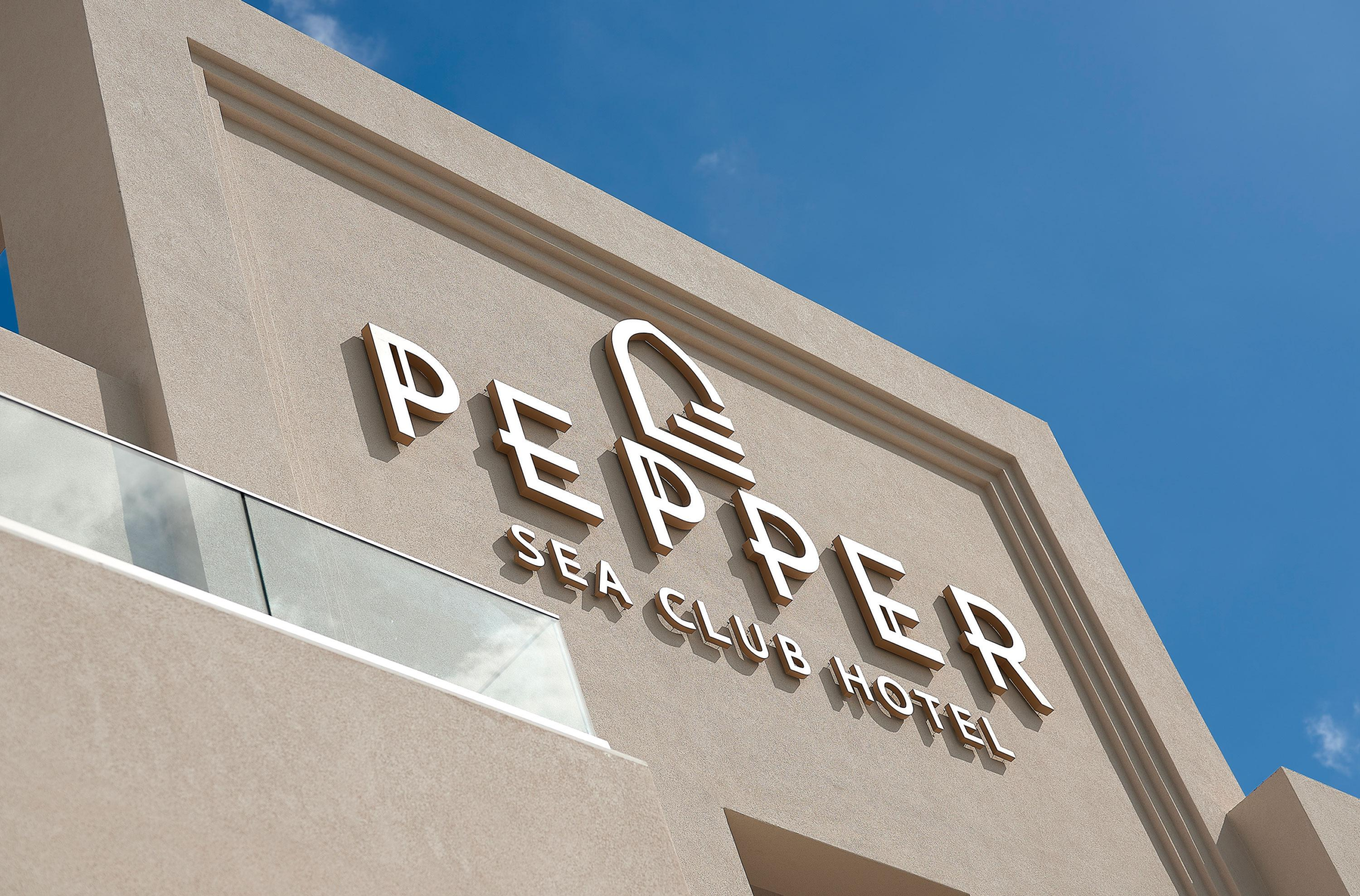 Marine grade stainless steel signage designed for beachfront buildings and coastal environments.