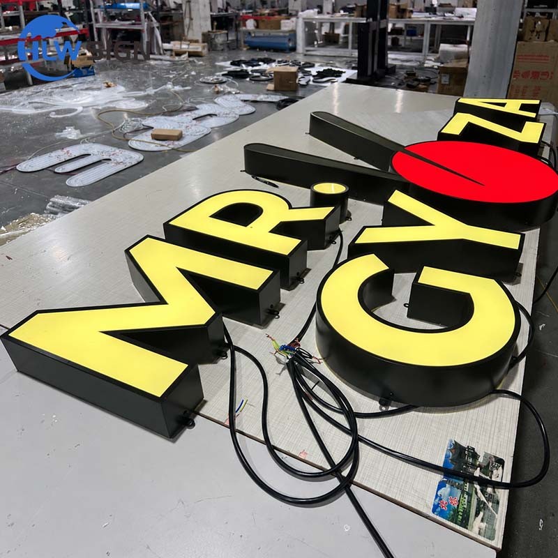 Outdoor front-lit LED channel letters with sealed wiring and drainage details