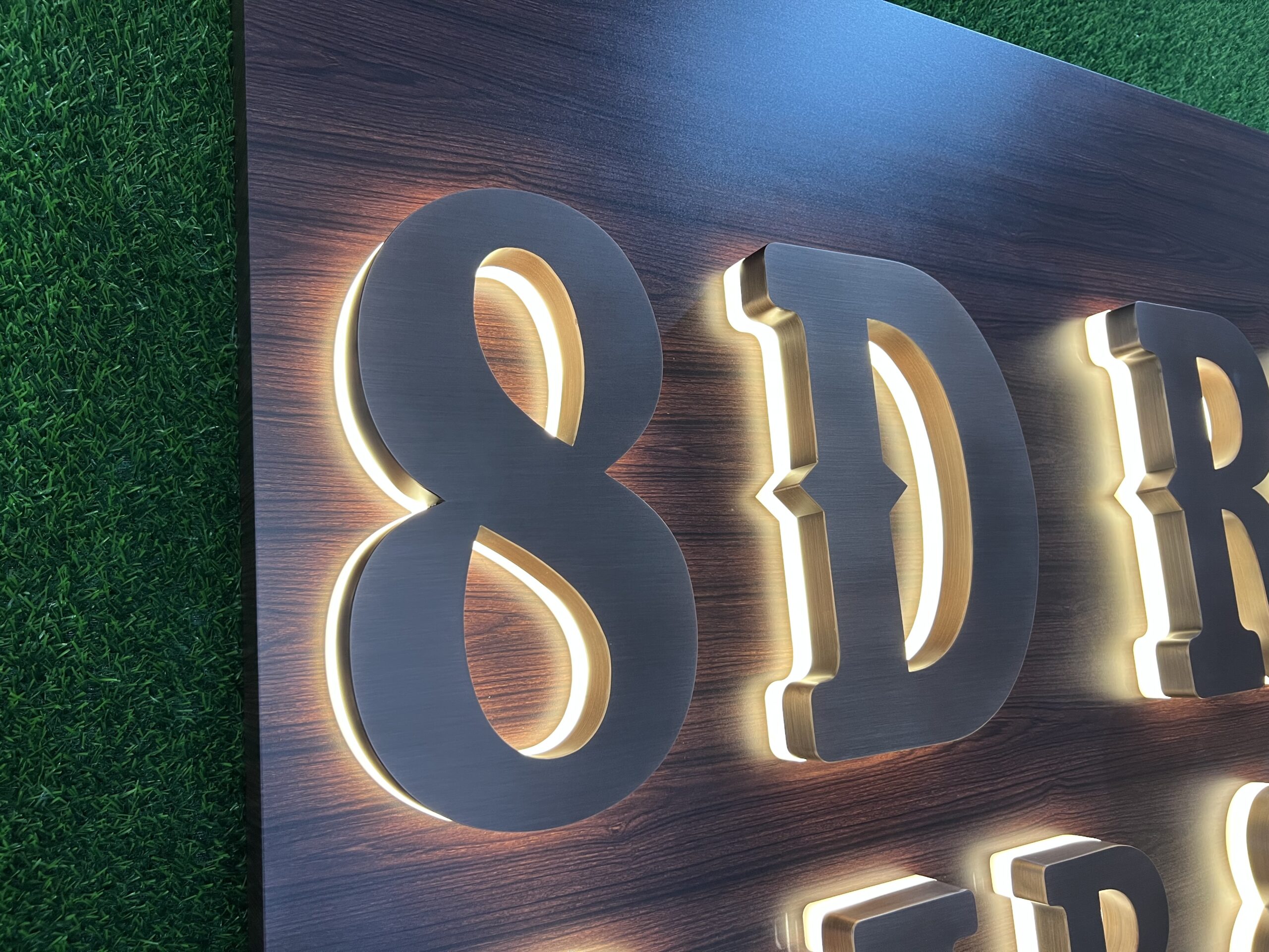 Wood-grain baked painted stainless steel backlit letters with a durable cured coating